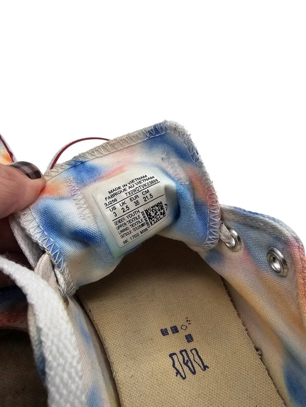 Converse All Star Kids Sz 3 sneakers in a colorful tie-dye low-top style